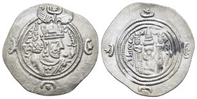 SASANIAN KINGS. Husrav (Khosrau) II.(590-628). Drachm.

Obv : Crowned bust right.

Rev : Fire altar; attendant to left and right; star and crescent be...