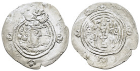 SASANIAN KINGS. Husrav (Khosrau) II.(590-628). Drachm.

Obv : Crowned bust right.

Rev : Fire altar; attendant to left and right; star and crescent be...
