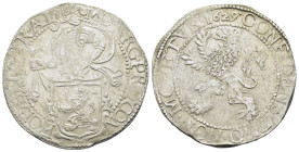 NETHERLANDS. West Friesland. Lion Dollar or Leeuwendaalder (1629)

Obv : MO ARG PRO CON FOE BEL WEST F.
Knight standing left, head right, holding up g...