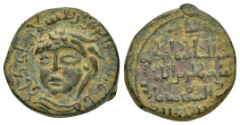 ARTUQID of MARDIN.Nasir al-Din Artuq Arslan.(1200-1239).No Mint.611 AH.AE Dirhem.

Obv : ناصر الدنيا و الدين ارتق ارسلان ملك ديار بكر(The Protector of...
