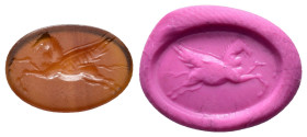 ANCIENT ROMAN CARNELIAN INTAGLIO.(1st-2nd century ).

Condition : Good very fine.

Material : Cornelian.

Weight : 0.74 gr.
Diameter : 14X9 mm.