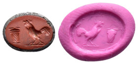 ANCIENT ROMAN RED JASPER INTAGLIO.(1st-2nd century ).

Condition : Good very fine.

Material : Jasper.

Weight : 1.04 gr.
Diameter : 11X8 mm.