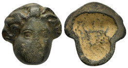 ANCIENT ROMAN BRONZE MASK.(Circa 1st-3rd century).Ae.

Condition : Good very fine.

Material : Bronze.

Weight : 8.33 gr.
Diameter : 23 mm.