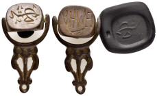 ANCIENT ISLAMIC BRONZE STAMP SEAL.(19th-20th century).Ae.

Condition : Good very fine.

Material : Bronze.

Weight : 14.50 gr.
Diameter : 35 mm.