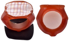 ANCIENT SASANIAN CARNELIAN RING.().

Condition : Good very fine.

Material : Cornelian.

Weight : 8.06 gr.
Diameter : 28 mm.