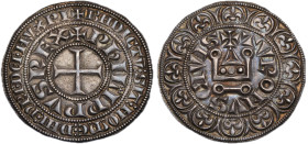 Philippe IV le Bel 1285–1314. 
Gros tournois à l'O longue, AG 4.14 g. 
Avers : Croix pattée 
Revers : Châtel tournois ; bordure de douze fleurs de lis...