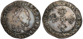 Henri III 1574-1589
Franc en argent au col fraisé, 1585 M, AG 13.86 g. 
Avers : Buste lauré et cuirassé à droite, portant une fraise 
Revers : Croix f...