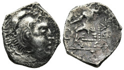 KINGS OF MACEDON. Alexander III 'the Great' (336-323 BC). Drachm. 

Obv: Head of Herakles right, wearing lion skin.
Rev: AΛΕΞΑΝΔΡΟΥ.
Zeus seated left ...