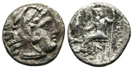 KINGS OF MACEDON. Alexander III 'the Great' (336-323 BC). Drachm. 

Obv: Head of Herakles right, wearing lion skin.
Rev: AΛΕΞΑΝΔΡΟΥ.
Zeus seated left ...