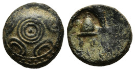 KINGS OF MACEDON. Alexander III 'the Great' (336-323 BC). Ae. 

Obv: Macedonian shield with pellet in three circles on boss.
Rev: Macedonian helmet be...