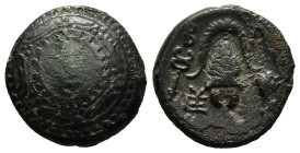 KINGS OF MACEDON. Alexander III 'the Great' (336-323 BC). Ae. 

Obv: Macedonian shield with pellet in three circles on boss.
Rev: Macedonian helmet be...