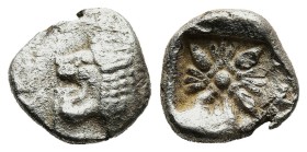 IONIA. Miletos. Obol or Hemihekte (Late 6th-early 5th centuries BC).
Obv: Forepart of lion right, head left.
Rev: Stellate pattern within incuse squ...