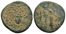 PONTOS.Amisos.(Circa 105-63 BC).Ae.

Obv : Aegis with Gorgon's head at center.

Rev : AΜΙΣΟΥ.
Nike advancing right, holding wreath and palm branch, be...
