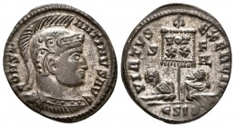 CONSTANTINO I. Follis. 310-317 d.C. Siscia. A/ Busto con casco y coraza a derecha. CONSTANTINVS AVG. R/ Vexillum con inscripción VOT XX en dos líneas,...