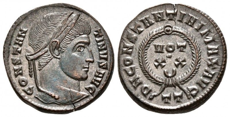 CONSTANTINO I. Follis. 310-337 d.C. Ticinum. A/ Busto laureado a derecha. CONSTA...