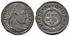 CONSTANTINO I. Follis, 310-337 d.C. Ticinum. A/ Busto laureado a derecha. CONSTANTINVS AVG. R/ Corona en el interior VOT/XX en dos líneas y creciente....