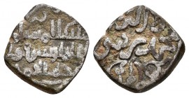 ALMORAVIDES. Ali Ibn Yusuf con Tashfin. Fracción de Dirham. 533-537 H. ¿Jaén?. Otras monedas con este estilo han sido atribuídas a la ceca de Jaén, es...