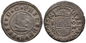 FELIPE IV. 16 Maravedís. 1661. Segovia S. Valor invertido, punto entre ensayador y ceca. Cal-1507; J.S. M-515. Ae. 2,80g. MBC. Muy escasa.