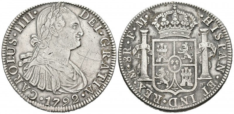 CARLOS IV. 8 Reales. 1792. México FM. Cal-685. Ar. 26,91g. Graffiti en anverso. ...