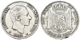ALFONSO XII. 50 Centavos de Peso. 1882. Manila. Cal-82. Ar. 12,45g. Limpiada y golpe en el canto. MBC-.