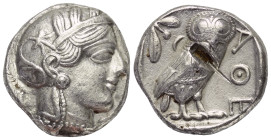 Attika. Athen.

 Tetradrachme (Silber). Ca. 454 - 404 v. Chr.
Vs: Kopf der Athena mit ölzweiggeschmücktem attischem Helm, Ohranhänger und Halskette...