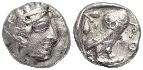 Attika. Athen.

 Tetradrachme (Silber). Ca. 454 - 404 v. Chr.
Vs: Kopf der Athena mit ölzweiggeschmücktem attischem Helm, Ohranhänger und Halskette...
