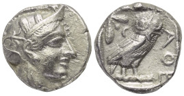 Attika. Athen.

 Tetradrachme (Silber). Ca. 454 - 404 v. Chr.
Vs: Kopf der Athena mit ölzweiggeschmücktem attischem Helm, Ohranhänger und Halskette...