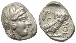 Attika. Athen.

 Tetradrachme (Silber). Ca. 286 - 267 v. Chr.
Vs: Kopf der Athena mit Profilauge mit ölzweiggeschmücktem attischem Helm, Ohranhänge...