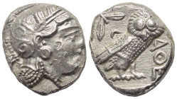 Attika. Athen.

 Tetradrachme (Silber). Ca. 286 - 267 v. Chr.
Vs: Kopf der Athena mit Profilauge mit ölzweiggeschmücktem attischem Helm, Ohranhänge...