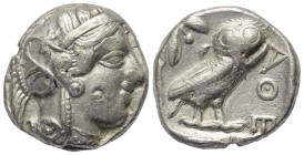 Attika. Athen. Gegengestempelte Prägungen.

 Tetradrachme (Silber). Ca. 454 - 404 v. Chr.
Vs: Kopf der Athena mit ölzweiggeschmücktem attischem Hel...