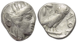 Attika. Athen. Gegengestempelte Prägungen.

 Tetradrachme (Silber). Ca. 454 - 404 v. Chr.
Vs: Kopf der Athena mit ölzweiggeschmücktem attischem Hel...