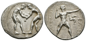 PAMPHYLIA. Aspendos. Stater (Circa 420-370 BC).
Obv: Two wrestlers grappling.
Rev: ΕΣΤFΕΔΙΙΥΣ / BA FE.
Slinger in throwing stance right, triskeles in ...