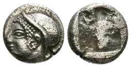 IONIA. Phokaia. Diobol (Circa 521-478 BC).
Obv: Archaic female head left, wearing earring and helmet or close fitting cap.
Rev: Quadripartite incuse s...