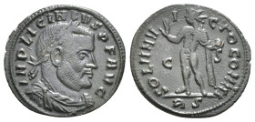 LICINIUS I (308-324). Follis. Rome. Obv: IMP LICINIVS P F AVG. Laureate and cuirassed bust right. Rev: SOLI INVICTO COMITI / ES. Sol standing left, ra...