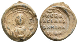 Byzantine lead seal. 	Probably Kiladenos
Κ(ύρι)ε β(οή)θ(ει) Βασίλιο …

Lord, help Basile …

Frontal bust of the Virgin Mary praying, wearing a me...