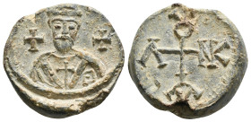 Byzantine lead seal.
Cruciform monogram : Νικολάου

Nicholas
22,17 g - 25,48 mm