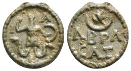 *Basilides of Alexandria and the Figure of Abrasax*
EGYPT. Uncertain. Gnostic Tessera, ca.2nd-4th century AD.
IA, Abrasax depicted frontally, with a r...