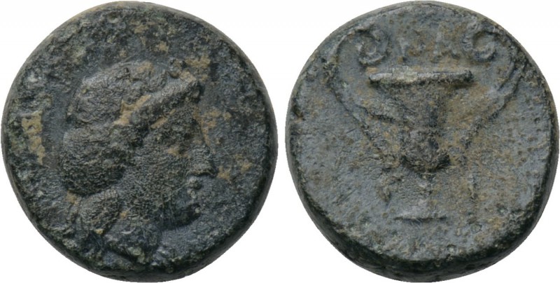 SICILY. Naxos. Ae (4th century BC). 

Obv: Head of Dionysos right, wearing ivy...