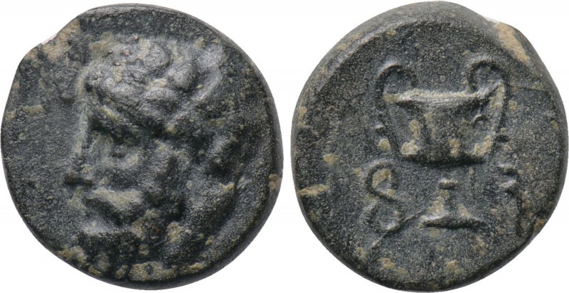 LYDIA. Uncertain (Sardes?). Ae (4th century BC). 

Obv: Head of Dionysos left,...