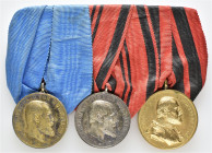 Spange mit 3 Medaillen: (1); Württemberg, Wilhelm II., Silbermedaille (28mm), o.J., Verdienstmedaille. Av.: Kopf des Königs nach rechts mit Umschrift....