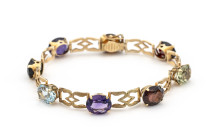 Farbstein Armband, 750 Gold, 8 Farbsteine in Ovalschliff je größe 10,5x 8,4mm, Länge ca. 18 cm, gemarkt "RJ 139"ca. 16,4g.