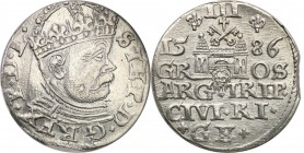 Stephan Batory . Trojak (3 grosze) 1586, Riga 
Odmiana trojaka z dużą głową króla. Na rewersie lilijki przy nominale.Egzemplarz z końca blachy, ale z...