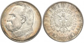 II RP. 10 zlotych 1936 Pilsudski 
Wyśmienicie zachowana moneta. Intensywny połysk menniczy, subtelna patyna. Rzadsza w takim stanie zachowania.Fische...