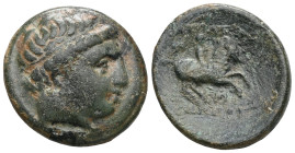 GREEK COINS MACEDONIA. KINGS OF MACEDONIA. Philip II, 359-336 BC Bronze, ca. 323 BC. Miletus. Diademed head facing right. Rev. Rider facing right, lef...