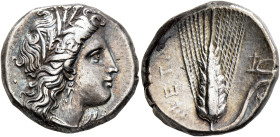 LUCANIA. Metapontion. Circa 330-290 BC. Didrachm or Nomos (Silver, 20 mm, 7.82 g, 1 h). Head of Demeter to right, wearing wreath of grain ears, triple...