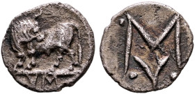 LUCANIA. Sybaris. Circa 550-510 BC. Obol (Silver, 9 mm, 0.41 g, 9 h). Bull standing left on dotted ground line, his head turned back to right; in exer...