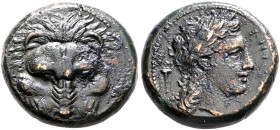 BRUTTIUM. Rhegion. Circa 351-280 BC. AE (Bronze, 21 mm, 10.72 g, 12 h). Lion's scalp facing. Rev. ΡΗΓΙ[ΝΩΝ] Laureate head of Apollo to right; to left,...