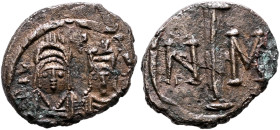 Justin II, with Sophia, 565-578. Decanummium (Bronze, 18 mm, 3.22 g, 3 h), Carthage. [VITA] Busts of Justin, on left, helmeted and cuirassed, and Soph...
