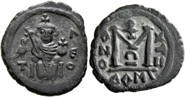 Umayyad Caliphate. temp. Yazid I ibn Mu'awiya, AH 60-64 / AD 680-683. Fals (Bronze, 21 mm, 3.51 g, 3 h), Arab-Byzantine type, 'Pseudo-Damascus' mint. ...