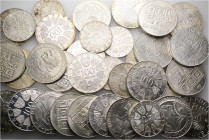 A lot containing 34 silver coins. All: Austria. 25 & 100 Schilling Silver coins. Extremely fine to FDC. Total weight: 719 g. LOT SOLD AS IS, NO RETURN...